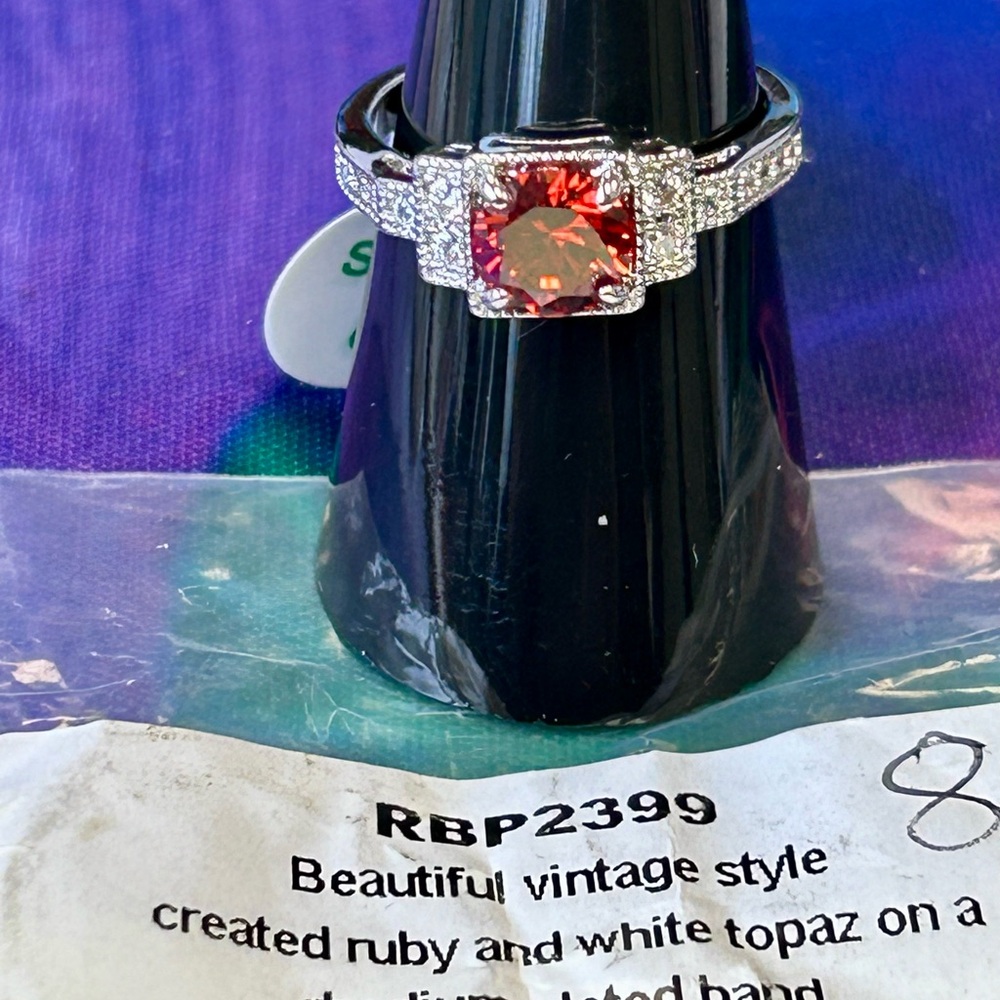 - Bomb party created Ruby and White Topaz ring. Size 8 NW